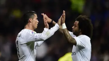 Cristiano Ronaldo e Marcelo, ídolos do Real Madrid (Foto: PIERRE-PHILIPPE MARCOU / AFP)