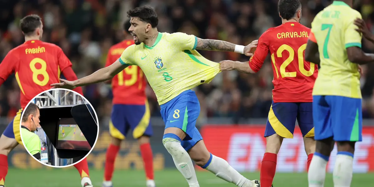 Lucas Paquetá é puxado pela camisa por Carvajal, jogador da Espanha