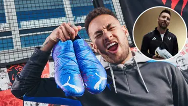 Neymar com a roupa da Puma e Lionel Messi com sua chuteira da Adidas